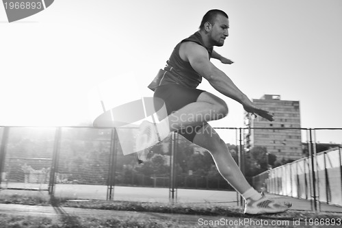 Image of young athlete running