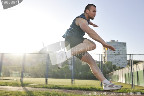 Image of young athlete running