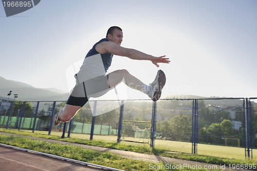 Image of young athlete running