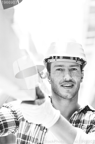 Image of hard worker on construction site