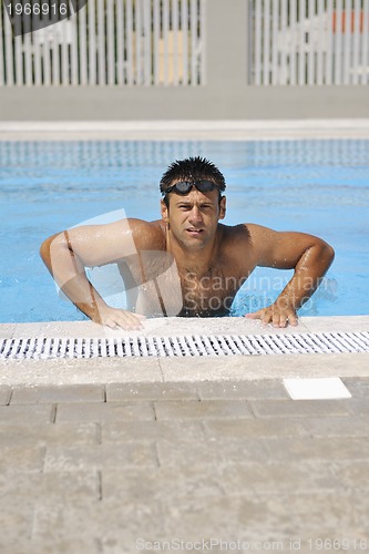 Image of young athlete at swimming pool