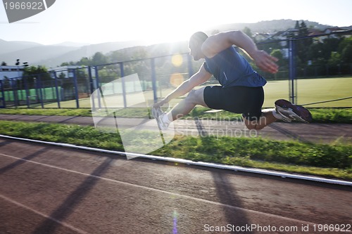 Image of young athlete running