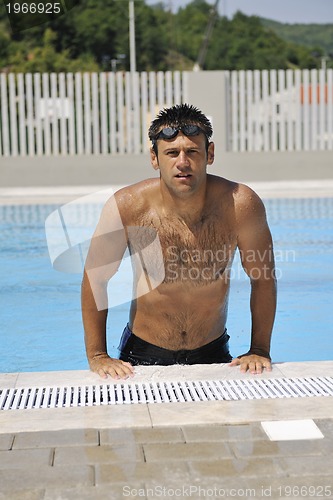 Image of young athlete at swimming pool