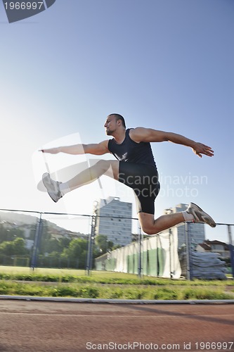 Image of young athlete running