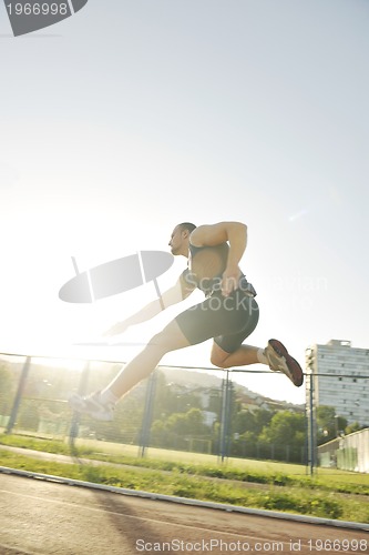 Image of young athlete running