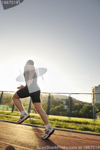 Image of young athlete running