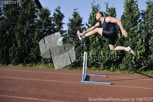 Image of young athlete running