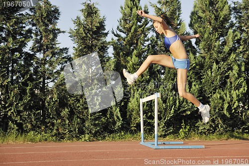 Image of woman jogging at early morning