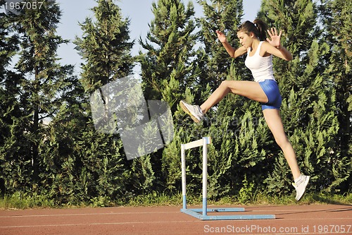 Image of woman jogging at early morning