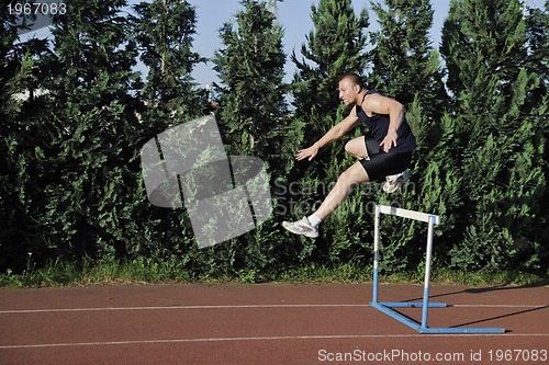 Image of young athlete running