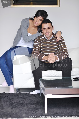 Image of happy young couple relax at home