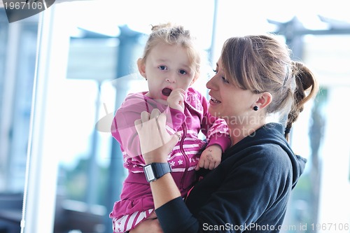Image of happy young family have fun  at home