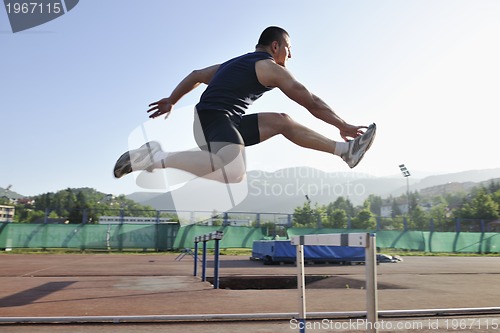 Image of young athlete running