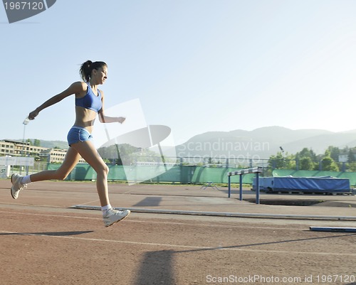 Image of woman jogging at early morning