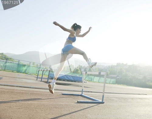 Image of woman jogging at early morning