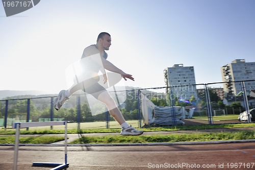 Image of young athlete running