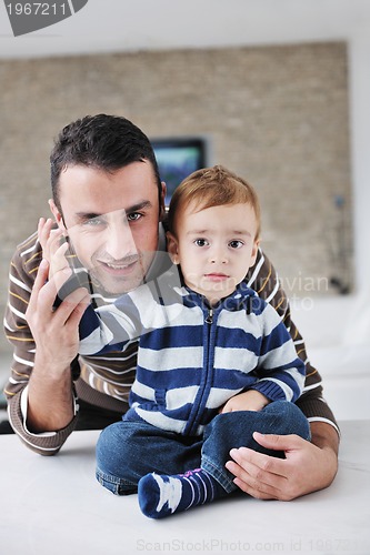 Image of happy young family have fun  at home