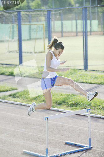 Image of woman jogging at early morning