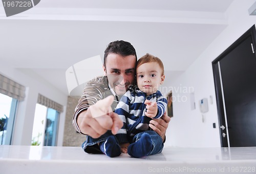 Image of happy young family have fun  at home