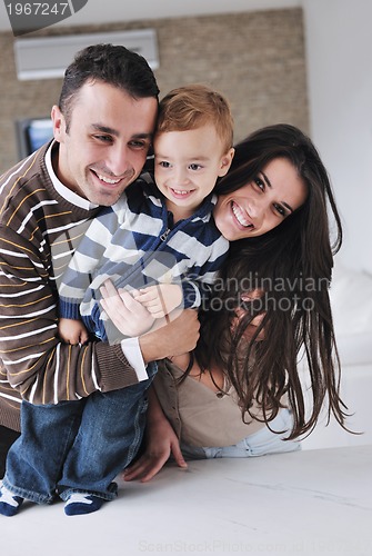 Image of happy young family have fun  at home