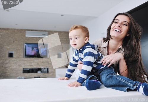 Image of happy mom and son together at home