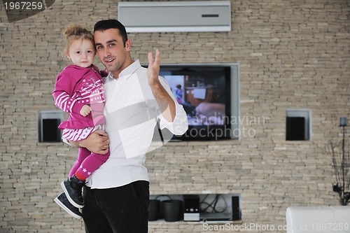 Image of happy young family have fun  at home