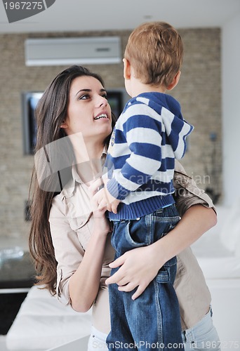 Image of happy mom and son together at home