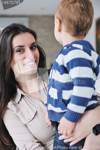 Image of happy mom and son together at home