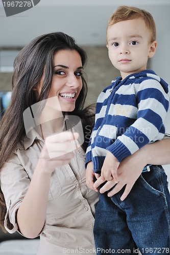 Image of happy mom and son together at home
