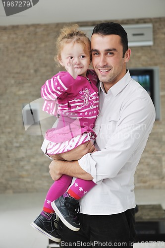 Image of happy young family have fun  at home