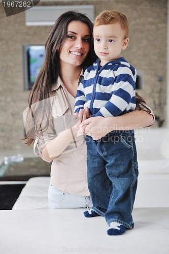 Image of happy mom and son together at home