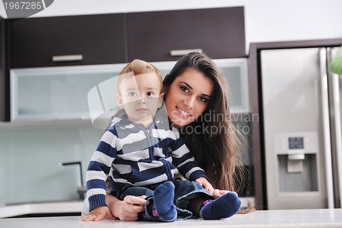 Image of happy mom and son together at home