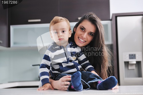 Image of happy mom and son together at home