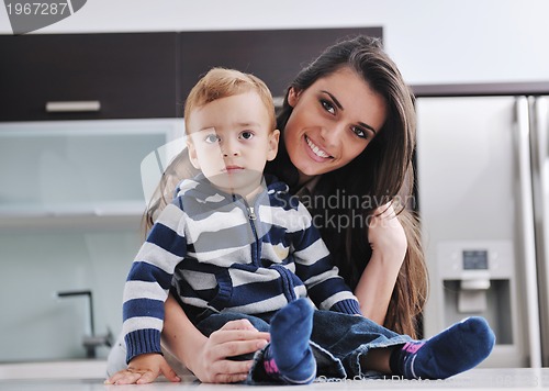 Image of happy mom and son together at home