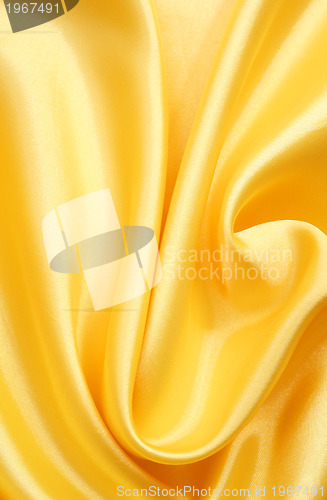 Image of Smooth elegant golden silk can use as background 