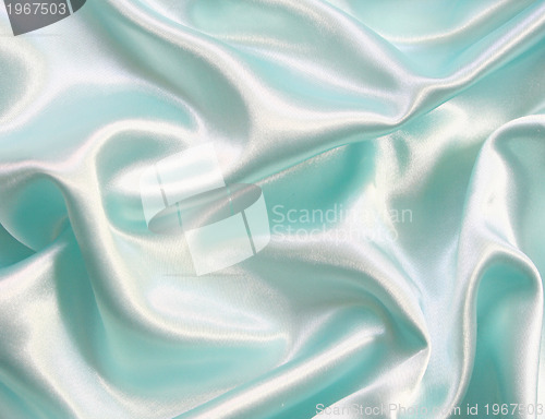 Image of Smooth elegant blue silk can use as background 