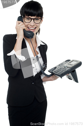 Image of Professional lady speaking on phone