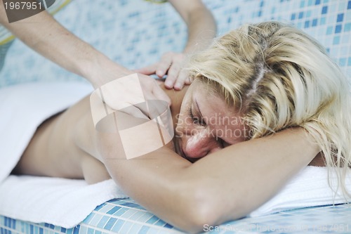 Image of woman relaxing at spa and wellness