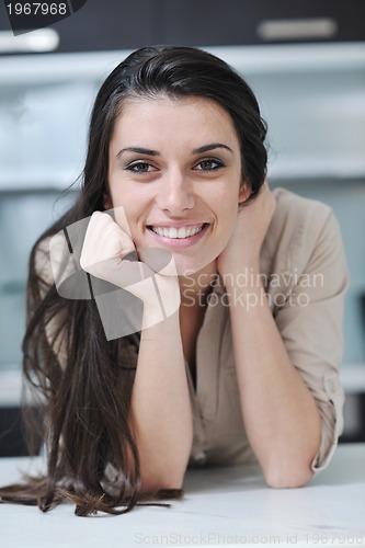 Image of young woman indoors portrait