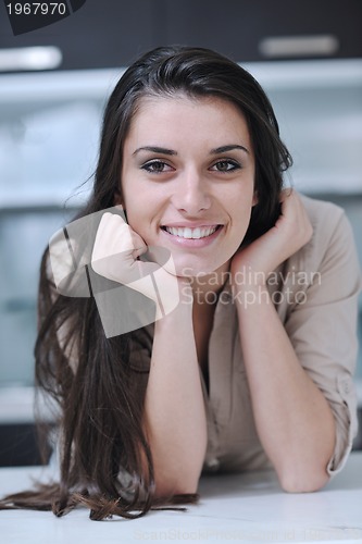 Image of young woman indoors portrait