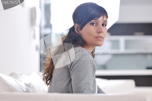Image of young woman indoors portrait