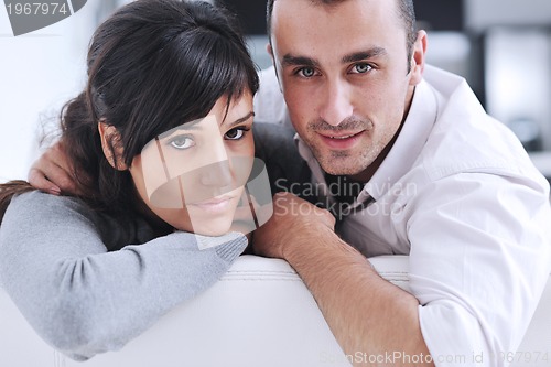 Image of happy young couple relax at home