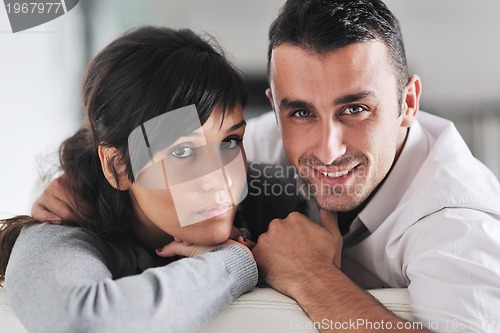 Image of happy young couple relax at home