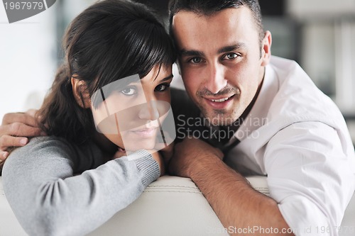 Image of happy young couple relax at home