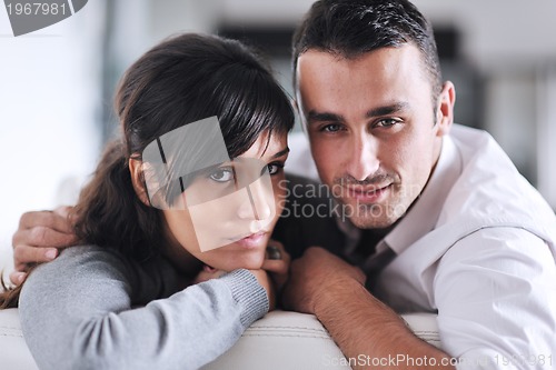 Image of happy young couple relax at home