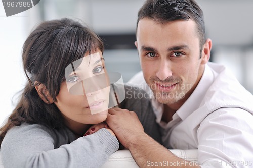Image of happy young couple relax at home