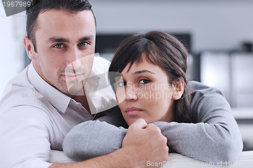 Image of happy young couple relax at home