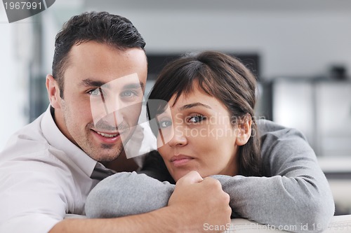 Image of happy young couple relax at home