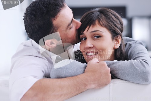 Image of happy young couple relax at home