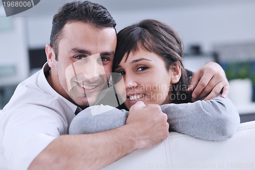 Image of happy young couple relax at home